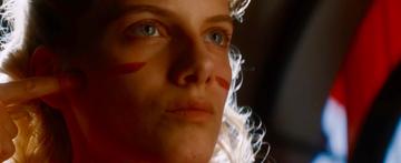 Still of Shosanna applying war paint